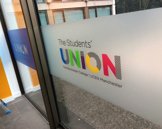 Window graphic displaying the text: "The Students' UNION" along with the subtitle "The Manchester College | UCEN Manchester" on a frosted glass surface.