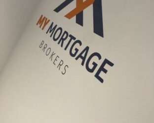 Wall graphic with the text "MY MORTGAGE BROKERS" in bold, navy blue and orange letters, with a stylised roof icon above.