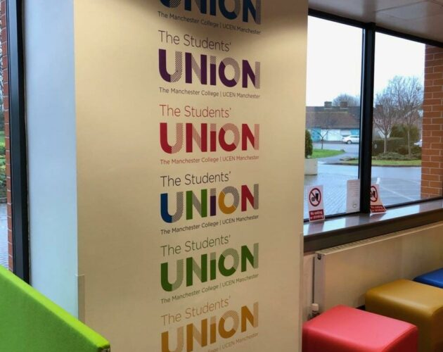 Wall graphic displaying the repeated logo "The Students' UNION" in different colours, with the subtitle "The Manchester College | UCEN Manchester."