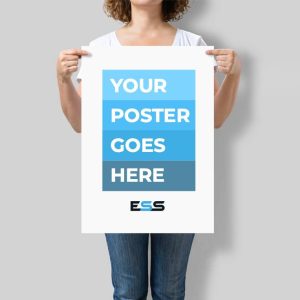 A woman holding a large A2-sized poster with the placeholder text "YOUR POSTER GOES HERE" in bold white letters on blue blocks, standing against a plain grey background.