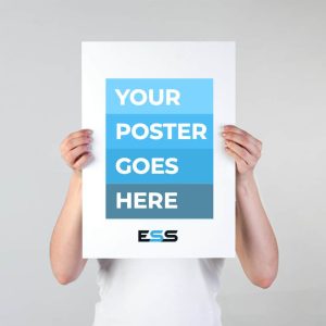 A person holding an A3-sized poster with the placeholder text "YOUR POSTER GOES HERE" in bold white letters on blue blocks, standing against a plain neutral background.