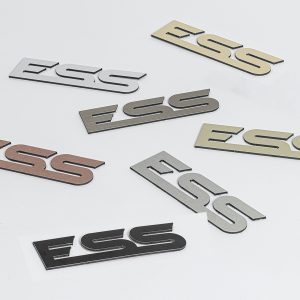 Brushed Aluminium Composite Flat Cut Letters spelling "ESS" arranged on a white background.
