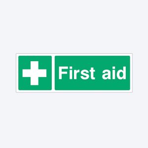 A green rectangular first aid sign with a white cross icon on the left and the words "First aid" on the right.
