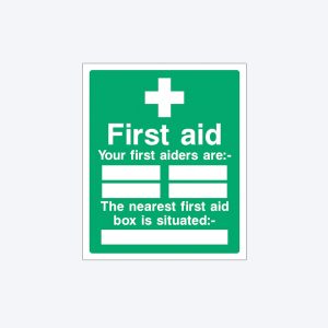 A green first aid sign with a white cross at the top. The sign contains the text "First aid," followed by "Your first aiders are:-" with blank spaces for names. It also states, "The nearest first aid box is situated:-" with an empty space for location details.