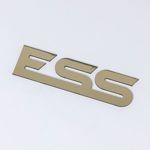 Gold Mirrored Aluminium Composite Flat Cut Letters spelling "ESS" arranged on a white background.