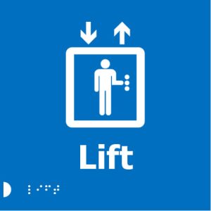 A blue background sign showing a white icon of a person inside a square, with a downward arrow above on the left and an upward arrow above on the right. Below the icon, the word "Lift" is written in bold white letters. Tactile Braille dots are located at the bottom left corner for accessibility.