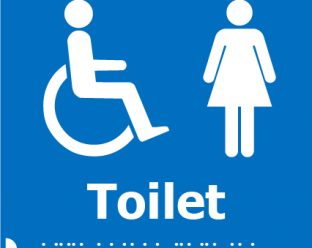 A blue square sign featuring white icons of a person in a wheelchair and a woman, with the word "Toilet" in bold white letters below, and Braille dots beneath.
