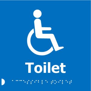 A blue square sign with a white wheelchair symbol above the word "Toilet" in bold white letters, with Braille dots beneath.