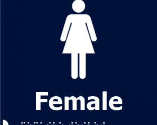 A navy blue background sign with a white icon of a female figure above the bold white word "Female" and Braille dots underneath.