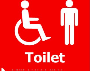 A red square sign with white icons of a person in a wheelchair and a standing person, with the word "Toilet" in bold white letters below, and Braille dots beneath.