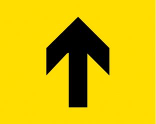 A yellow square background with a black upward-pointing arrow in the centre.