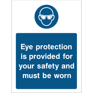 Warning sign with a blue background, white text “Eye protection is provided for your safety and must be worn,” and an icon of safety glasses at the top
