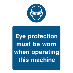 Warning sign with a blue background, white text “Eye protection must be worn when operating this machine,” and an icon of safety glasses at the top