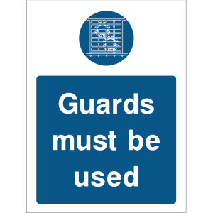Warning sign with a blue background, white text “Guards must be used,” and a safety symbol at the top