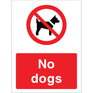 No Dogs warning sign with bold white text on red background