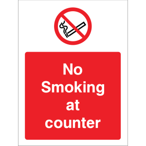 Outdoor "No smoking at counter" warning sign with no smoking symbol