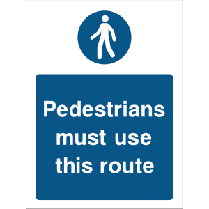 Warning sign with a blue background, white text “Pedestrians must use this route,” and a pedestrian icon at the top