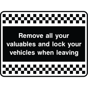 Outdoor warning sign with checkered border and text: "Remove all your valuables and lock your vehicles when leaving"