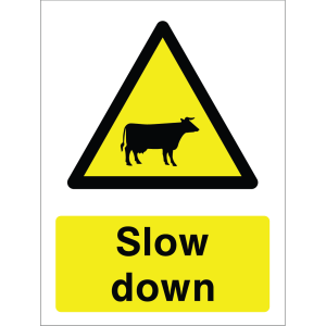 A durable outdoor warning sign featuring a yellow triangle with a black cow silhouette and the message “Cattle crossing” in bold black letters on a yellow background, printed on weather-resistant material.