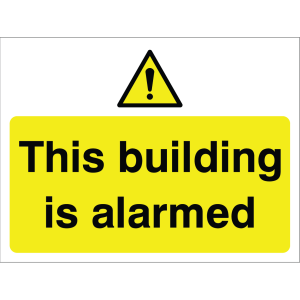 Outdoor warning sign with exclamation icon and message "This building is alarmed" in black on yellow background