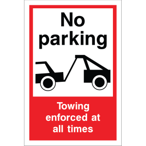 Outdoor "No parking" and "Towing enforced at all times" sign with tow truck illustration, warning that vehicles will be towed at all times