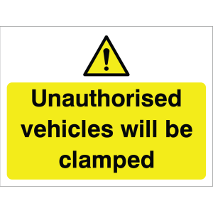 Outdoor warning sign with exclamation icon and message "Unauthorised vehicles will be clamped" in black on yellow background