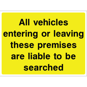 Outdoor "All vehicles entering or leaving these premises are liable to be searched" warning sign with black text on yellow background