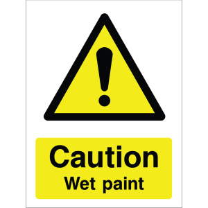 Warning sign showing a black triangle icon with an exclamation mark and the message: "Caution Wet Paint." on yellow background, used to alert about wet paint hazards.