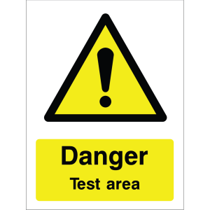 A yellow background with a black triangle at the top, featuring a black exclamation mark, and bold black text below: "Danger. Test area." Designed to warn personnel and visitors of a hazardous testing zone.