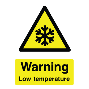 Warning sign showing a black triangle icon with a snowflake and the message: "Warning. Low temperature." on yellow background, used to alert about cold hazards.