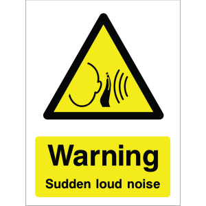 Warning sign showing a black triangle icon with a head wearing ear protection and sound waves, and the message: "Warning. Sudden loud noise." on yellow background, used to alert about sudden loud hazards.